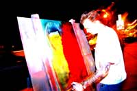 Eichelberger at work on a Pop painting.